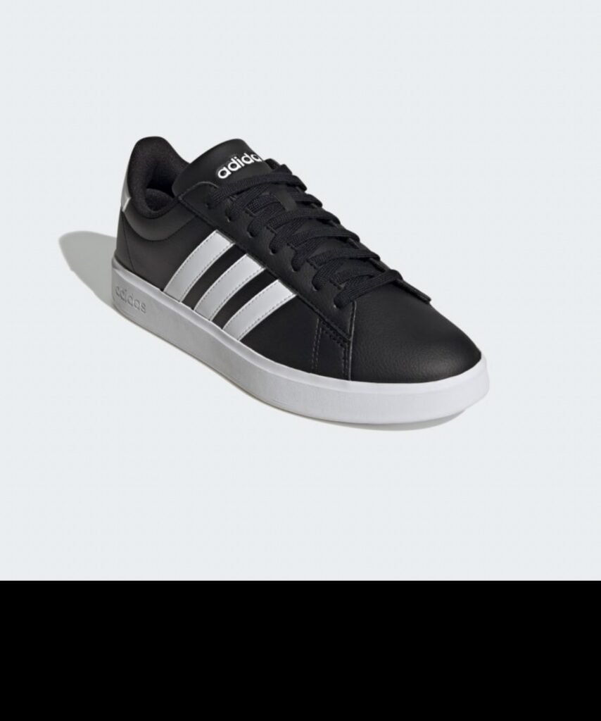 Tenis adidas negro con franjas blancas y suela blanca